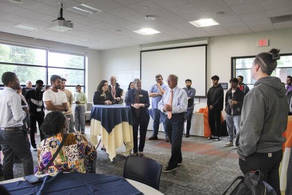 President Todd Pfannestiel and Provost Stephanie Nesbitt welcome incoming International students to Utica University.